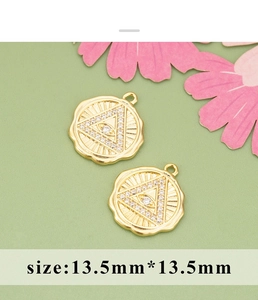 Detailed size view of 13.5mm gold evil eye charms with cubic zirconia inlay for DIY jewelry