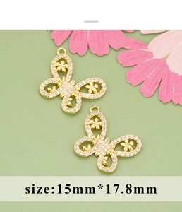 Detailed view of 15mm butterfly jewelry charms with micro-pave cubic zirconia inlay