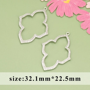Silver hollow four-petal flower pendant with white zircons, size 32.1mm by 22.5mm