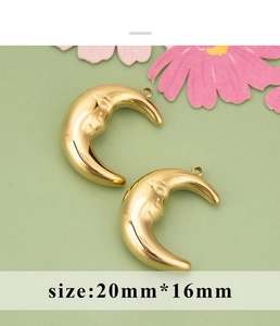 Detailed macro view of 20mm gold moon face pendants for jewelry making and DIY projects