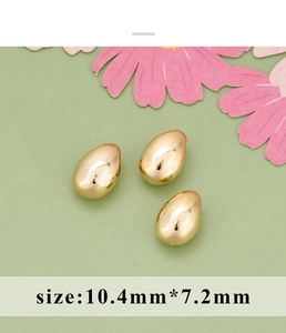 Detailed view of three 10.4x7.2mm 18K gold-plated water drop beads for jewelry DIY