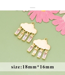Macro shot of 18mm gold-plated cloud pendants with colorful zircon tassel charms