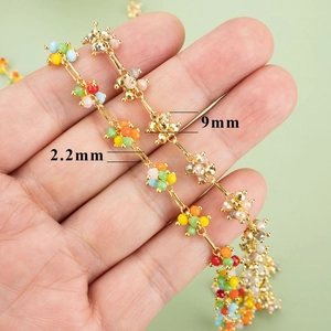 Handmade gold plated copper chain with multi-colored 9mm beaded flower clusters