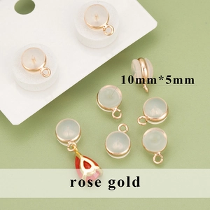 DIY jewelry earring findings rose gold metal with clear silicone backs measuring 10mm by 5mm