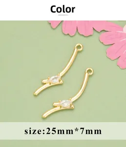 Detailed view of an 18K gold-plated bow charm with marquise zircon, size 25mm x 7mm