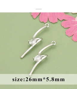 Detail of 18K gold plated bow zircon S-bar pendant connectors for DIY earring making