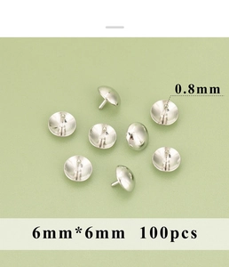 Detailed view of 18K gold-plated earring stopper pin caps with 0.8mm needle and 6mm base size