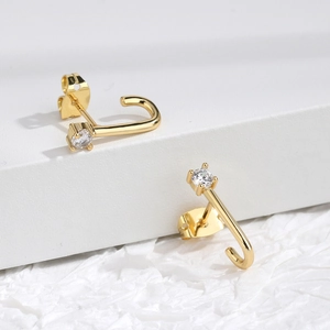 Elegant gold J-shaped hook earrings with round zircon stones and butterfly backs