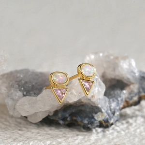 Geometric gold stud earrings with round white opal and pink triangle zircon stones