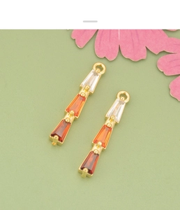Detail of 18K gold plated charms with gradient zircon stones for DIY jewelry making