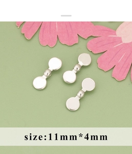 Makroaufnahme von 11mm silbernen Barbell-Perlen für DIY Halsketten und Armband-Design