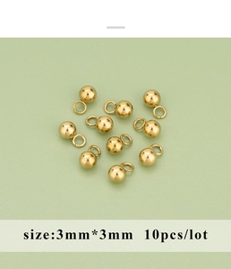 Macro detail of 3mm gold-plated stainless steel round spacer beads with 10pcs pack