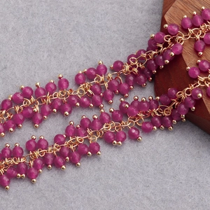 Detail of 18K gold-plated beads chain with purple faceted stones for DIY jewelry