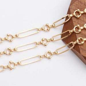 Close-up of 18K gold plated cross chain with textured oval links for DIY jewelry making