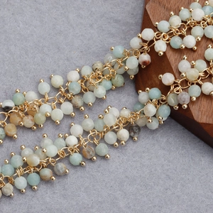 Close-up of 18K gold plated beaded chain with turquoise and white natural stones for DIY