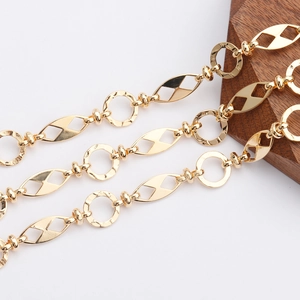 Macro detail of 18K gold plated O-chain with hollow geometric links for DIY jewelry making