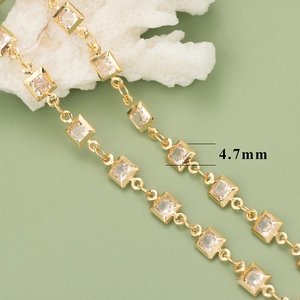 Detail view of 4.7mm square zircon settings on 18K gold plated minimalist copper chain
