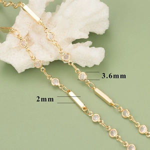 Detail of 18K gold plated tube chain featuring 3.6mm cubic zirconia and 2mm metal tubes