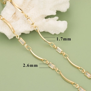 Close-up of 18K gold plated chain with 2.6mm rectangular zircons and 1.7mm metal bars