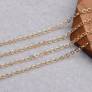 Macro detail of 18K gold-plated circular cross chain for DIY jewelry making