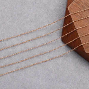 Macro detail of 18K rose gold plated rolo chain for DIY jewelry making accessories