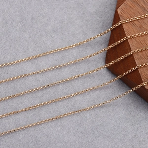 18K gold-plated minimalist rolo chain for jewelry making DIY projects on grey felt