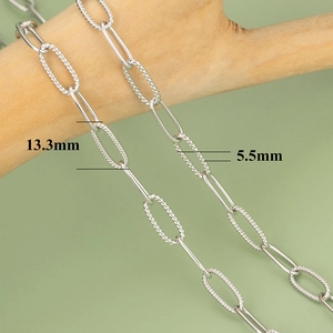Macro detail of 18K gold plated textured oval links chain for DIY jewelry making