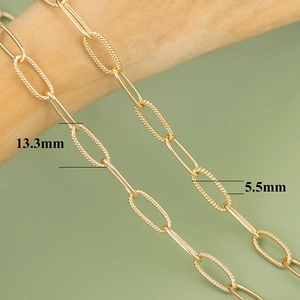 Detail of 18K gold plated chain links with 13.3mm length and textured rope pattern