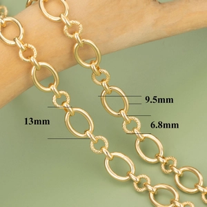 18K gold plated cable chain with polished oval and textured rings in various sizes