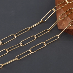 Close-up of polished 18K gold-plated paperclip chain links for DIY jewelry making