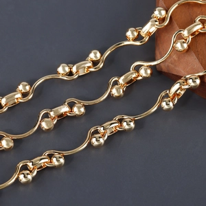 Close-up of 18K gold plated wavy chain with spherical joints for DIY jewelry making