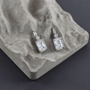 Elegant 18k gold plated earring parts with large rectangular zircon on gray stone