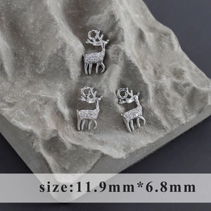 Three rhodium plated reindeer pendants with cubic zirconia, size 11.9mm by 6.8mm