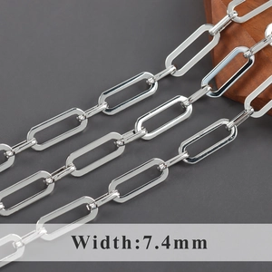 Detail view of 7.4mm wide silver rectangular paperclip chain with polished flat links