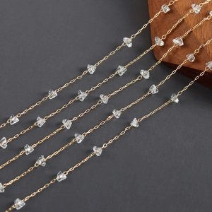 Detail shot of 18k gold plated chain with irregular transparent crystal beads DIY material