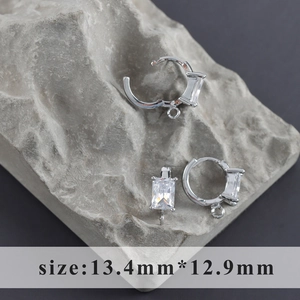 Detail of 18k gold plated petal earring hooks with rectangle zircon and hanging loop