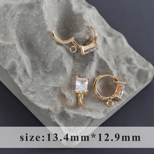 Close-up of 18k gold plated petal earring hoops with rectangular zircon and DIY loop