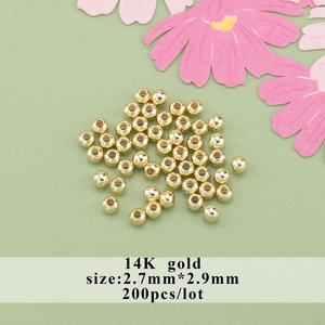 Set di 200 perline distanziatrici cave placcate oro 14K da 2,7mm per gioielli DIY