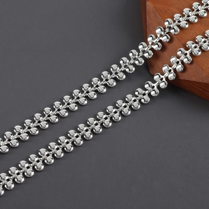 Detailed macro view of 18k rhodium plated hollow leaf metal chain links for jewelry DIY