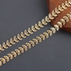 Close-up of 18k gold plated hollow leaf chain links for DIY jewelry making material