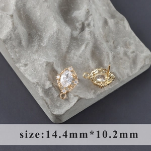 Detail van 18k vergulde sterbloem oorbelbedels met afmetingen 14,4mm bij 10,2mm