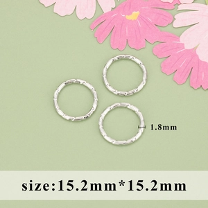 Macro view of textured rhodium-plated rings set with 1.8mm band width dimensions