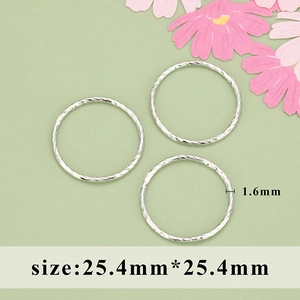 Detailed view of silver twist rings with 1.6mm thickness and 25.4mm diameter for DIY jewelry