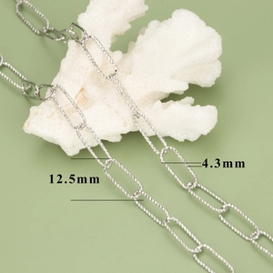 Silver paperclip chain with textured links measuring 12.5mm by 4.3mm for DIY jewelry