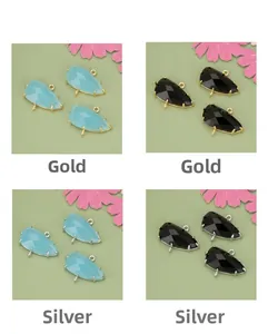 Detailed view of faceted glass teardrop pendants in 18k gold and silver plated settings