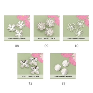 Detailed view of DIY 18k gold plated flower pendants and jewelry making components
