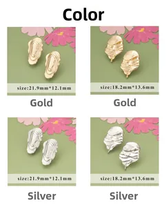 Detailed view of 18K gold and silver irregular textured earrings with exact dimensions