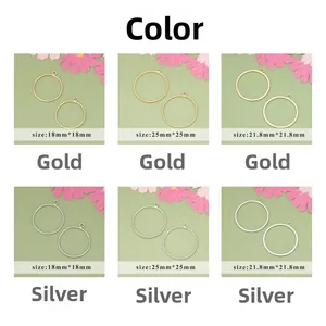 Detail of 18k gold plated geometric round charms in gold and silver for DIY jewelry