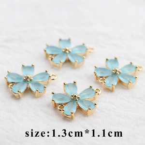 18k gold plated four-leaf flower charms with light blue zircon stones for jewelry making