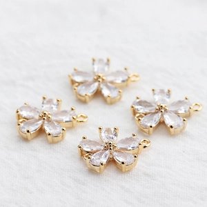 Set of four 18k gold plated four-leaf flower charms with clear marquise zircon stones